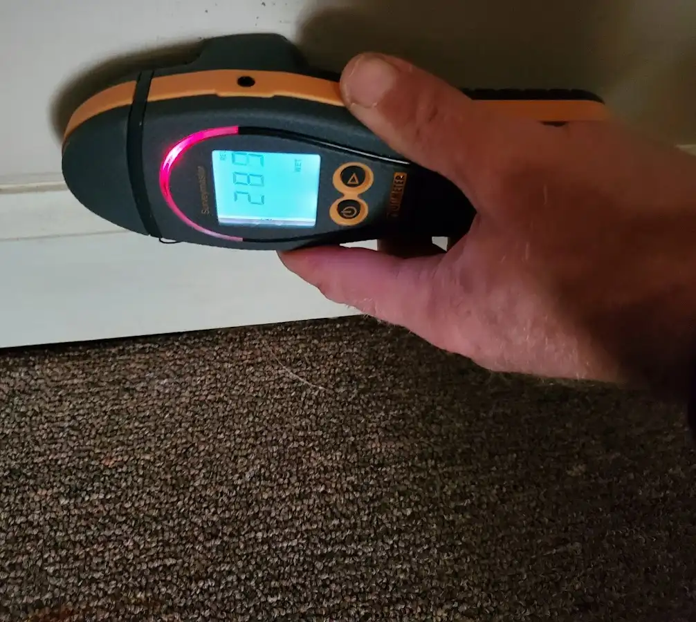 Moisture detection at baseboard during Storm Damage Restoration in Cornwall